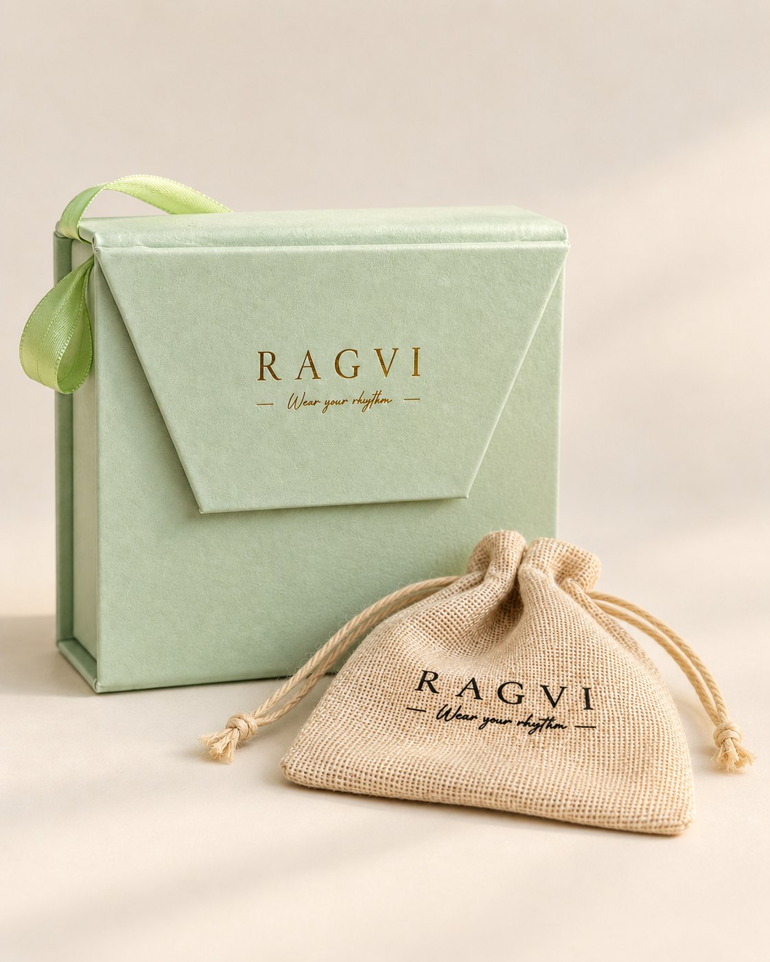 The RAGVI gift box with the jute pouch in front of it